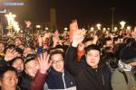 Jan. 1, 2018 -- People watch the national flag-raising ceremony at the Tian`anmen Square in Beijing, capital of China, Jan. 1, 2018. The responsibility for guarding China`s national flag and firing salute cannons at the Tian`anmen Square was transferred to the Chinese People`s Liberation Army (PLA) from Jan. 1, 2018, as authorized by the Central Committee of the Communist Party of China. Before Jan. 1, the ceremony was conducted by the armed police. (Xinhua/Luo Xiaoguang)