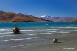 Jan. 2, 2018 -- Photo taken on Dec. 31, 2017 shows the scenery of the Yamzbog Yumco Lake in Nagarze County of Shannan City, southwest China`s Tibet Autonomous Region. The Yamzbog Yumco Lake is one of the region`s three largest sacred lakes. (Xinhua/Liu Dongjun)