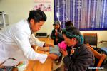 Jan. 17, 2018 -- Doctor Wangzhab checks a woman in a health center in Pumaqangtang Township of Nagarze County in Shannan City, southwest China`s Tibet Autonomous Region, Jan. 14, 2018. The average temperature in Pumaqangtang Township is seven degrees centigrade below zero with the altitude reaching 5,373 meters. Wangzhab was born in 1991, as a member of the Communist Party of China, he gave up the chance to work in city after graduation and chose to work in the health center in Pumaqangtang Township where he was responsible for the health of nearly 1,100 people. (Xinhua/Zhang Rufeng)