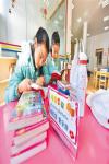 Jan. 19, 2018 -- Photo shows Tenzin Kangzhu, a sixth grade student from the Lhasa experimental primary school is reading with her friends in the Library of the Tibet Autonomous Region in Lhasa, capital city of the region in southwest China on Jan. 4, 2018. To enjoy their two-month winter holiday, some pupils choose to study dancing, some choose to learn calligraphy or painting, and some others choose to take exercises or read to spend their time.