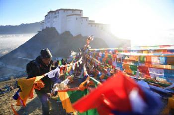 New prayer flags seen in China's Tibet to celebrate Tibetan New Year