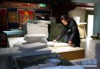 Jan. 30, 2018 -- Photo taken on Jan. 25 shows staff of the Potala Palace in southwest China`s Tibet are preparing for the exhibition to be held in the Capital Museum in Beijing, capital of China, where 185 precious cultural relics from 13 cultural relics protection sits in Tibet will be displayed to the public.