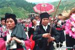 Feb. 11, 2018 -- File photo taken on Feb. 7, 1998 shows people of Yao ethnic group celebrating the Spring Festival at Zhoujia Village in south China`s Guangxi Zhuang Autonomous Region. As a country with 56 ethnic groups, China unfolds its charm of diversification during the Spring Festival. Spring Festival, or better known as Chinese Lunar New Year, is the most important festival for all Chinese, which has a history of more than 4,000 years. It is an occasion for home returning, New Year goods preparing, celebrating, and foremost, family reunion. (Xinhua)