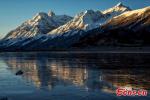 Feb. 28, 2018 -- Ranwu Lake is one of the largest lake in eastern Tibet. The Lagu Glacier is located in the north side of Ranwu Lake, where the snow melts injecting into the lake. The smooth surface of the lake was like a mirror. The placid lake reflected the golden snow mountains at sunrise and the stars at night.(Photo/Ma Qian)
