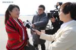 Mar. 2, 2018 -- Gesang Degyi (L), a deputy to the 13th National People`s Congress (NPC) from Tibet Autonomous Region, receives an interview upon her arrival in Beijing, capital of China, March 2, 2018. The First Session of the 13th NPC will open on March 5. (Xinhua/Jin Liwang)
