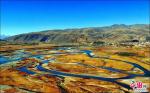 Mar. 2, 2018 -- Photo shows the scenery along the bank of the Yarlung River when flowing through the Garze Tibetan Autonomous Prefecture of southwest China`s Sichuan Province. [Photo/china.org.cn]