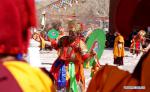 Mar. 5, 2018 -- A monk performs religious dance at the Qoide Monastery in Gonggar County of Shannan Prefecture, southwest China`s Tibet Autonomous Region, March 2, 2018. (Xinhua/Jigme Dorje)