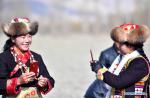Mar. 19, 2018 -- Farmers make live broadcasts of a spring ploughing ceremony in a village in Nedong District of Shannan, southwest China`s Tibet Autonomous Region, March 17, 2018. Traditional spring ploughing ceremonies took place in Tibet`s major cultivation areas on Saturday to pray for a year with good harvests. (Xinhua/Chogo)