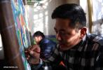 Mar. 29, 2018 -- An artist makes Tangka painting in a Tangka shop near Porgor Street of Lhasa, capital of southwest China`s Tibet Autonomous Region, Nov. 29, 2017. Tangka, a style of Tibetan art that involves painting on embroidery, has been liked by tourists thanks to a thriving development of tourism in Tibet region, where over 2,000 Tangka artists can create about 1,000 pieces of Tangka paintings every year. (Xinhua/Jigme Dorje) 