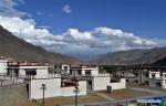 June 21, 2018 -- Photo taken on June 11, 2018 shows newly-built homes for residents who are to be relocated from Rungma Township of Nyima County to Katrug Village in Lhasa, southwest China`s Tibet Autonomous Region. (TO GO WITH Xinhua Headlines: Relocation changing lives on Tibetan plateau) (Xinhua/Chogo)