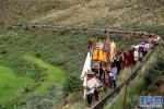 July 17,2018--Tibetan farmers celebrate Wangguo Festival Saturday at Layu Township of Qiongjie County, Shannan Prefecture, Southwest China`s Tibet Autonomous Region. Photo by Lhundrup Tsering. 