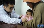July 25,2018--On July 11th, `The Angel`s Tour: Screening for Congenital Heart Disease for Impoverished Children in Tibet` formally launched. A team of experts held a week-long public screenings in Nagqu and Lhasa. The event screened around 300 impoverished kids with congenital heart disease, and anyone who met surgery requirements could go to the Cardiovascular Hospital of Zhengzhou City in central China for free surgeries and treatment.[Photo/Xinhua]