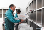 July 31,2018--Postal courier Cering Quba sorts newspapers at the county branch of China Post in Nagarze County in Shannan, southwest China`s Tibet Autonomous Region, July 23, 2018. In Pumaqantang Township, the highest township in China, working as a postal service staff means delivering mails to addresses at altitudes of 5,000 meters and above. Gesang Cering, 29, is a motorbike courier with the local township branch of China Post. Twice a week, Gesang calls on the plateau villages under the township on a 160-km route, coping with extreme oxygen and temperature conditions. Despite its harsh geography, Tibet Autonomous Region has substantially improved the local postal service over the four decades since China`s reform and opening up. By the end of 2017, the postal road network had managed to cover all towns and counties within the autonomous region. (Xinhua/Li He)