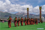 Aug.10,2018--Herdswomen dance during a performance in the opening ceremony of a horse racing festival in Damxung County, southwest China`s Tibet Autonomous Region, Aug. 8, 2018. Dangjiren horse racing is originated from military parade of Mongolian cavalry since 17th century. (Xinhua/Cen Yunpeng)