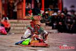 Aug. 31, 2018 -- The annual cham dance at a monastery in Qonggyai county, Southwest China`s Tibet autonomous region. The dance, called `cham` in the Tibetan language, is believed to ward off disaster and ghost and bring luck and happiness. The dancers, usually lamas, wear masks of various animals and mythical figures as they perform to the accompaniment of religious music. [Photo/China News Service]