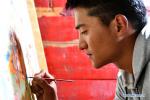 Sept. 21, 2018 -- A member of Qiujiu Tangka Cooperative creates Tangka painting in Gyanmda County of Qamdo, southwest China`s Tibet Autonomous Region, Sept. 19, 2018. The Qiujiu Tangka Cooperative, founded by Xerab Qiujiu, an heir to the Tangka painting art in Kargang Town of Gyanmda County, has recruited more than 40 children from impoverished families since 2014 to help them grasp a skill in getting rid of poverty. (Xinhua/Zhang Rufeng)