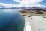 Sept. 28, 2018 -- Aerial photo taken on Sept. 9, 2018 shows a view of Lake Manasarovar in Ngari, southwest China`s Tibet Autonomous Region. The Ngari area has an average altitude of over 4,000 meters above sea level. (Xinhua/Purbu Zhaxi)