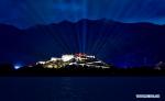 Oct. 9, 2018 -- A light show themed on `I Love China` is staged in front of the Potala Palace in Lhasa, capital of southwest China`s Tibet Autonomous Region, Oct. 7, 2018. (Xinhua/Purbu Zhaxi)