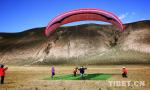 Oct. 10, 2018 -- The first Tibet paraglider performance at fixed points, one of the 6th China Tibet mountaineering convention series activity, was held in Yangbajain alpine training base, Damxung County, Lhasa City recently. Paragliders from all over the country attended the performance. Tibet has the unique environment for paragliding. There are no hills or jungles, or various high-tension cables; the sunlight and air flow condition are all favorable for paragliding.