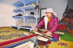 Oct. 17, 2018 -- Photo shows a worker named Zhusang weaving traditional handicrafts in the poverty alleviation workshop of Yangbajain Town, Lhasa City, southwest China` s Tibet Autonomous Region. [China Tibet News/ Tenzin Xidan]