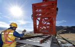 Oct. 18, 2018 -- A worker directs a track laying machine at the construction site of the section between Lhasa and Nyingchi of the Sichuan-Tibet Railway in Gonggar County of southwest China`s Tibet Autonomous Region, Oct. 16, 2018. The Sichuan-Tibet Railway climbs from the Sichuan Basin several hundred meters above sea level to the `Roof of the World`, at an altitude of more than 4,400 meters. (Xinhua/Chogo)