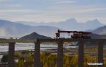 Oct. 18, 2018 -- A track laying machine works at the construction site of the section between Lhasa and Nyingchi of the Sichuan-Tibet Railway in Gonggar County of southwest China`s Tibet Autonomous Region, Oct. 16, 2018. The Sichuan-Tibet Railway climbs from the Sichuan Basin several hundred meters above sea level to the `Roof of the World`, at an altitude of more than 4,400 meters. (Xinhua/Purbu Zhaxi)