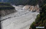 Oct. 19, 2018 -- Aerial photo taken on Oct. 18, 2018 shows the dried-out lower reaches of the Yarlung Tsangpo River in Menling County, southwest China`s Tibet Autonomous Region. More than 6,000 people have been evacuated after a barrier lake formed following a landslide in the Yarlung Tsangpo River in southwest China`s Tibet Autonomous Region, local authorities said Thursday. According to the local disaster relief headquarters, the landslide struck during the early hours of Wednesday near a village in Menling County, blocking the river`s waterway. The amounts of water in the lake has surpassed 300 million cubic meters. No casualties have been reported. Authorities in Tibet have launched an emergency response, monitoring the lake`s water level, evacuating local residents and sending relief supplies to the disaster-hit areas. (Xinhua/Chogo)