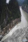 Oct. 22, 2018 -- Aerial photo taken on Oct. 20, 2018 shows the scene of an overflow from a landslide-caused barrier lake on the Yarlung Tsangpo River in Menling County, southwest China`s Tibet Autonomous Region. Water levels are dropping after an overflow at a barrier lake formed after a landslide in the Yarlung Tsangpo River in southwest China`s Tibet Autonomous Region, local officials said Friday. (Xinhua/Purbu Zhaxi)