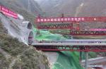 Nov. 5, 2018 -- Aerial photo taken on Nov. 3, 2018 shows the construction site of Keku Bridge in Aba Tibetan and Qiang Autonomous Prefecture, southwest China`s Sichuan Province. The closure of Keku Bridge, a key project of Wenchuan-Ma`erkang expressway, was finished on Saturday. (Xinhua/Liu Kun)