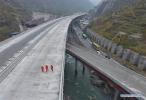 Nov. 5, 2018 -- Aerial photo taken on Nov. 3, 2018 shows the construction site of Keku Bridge in Aba Tibetan and Qiang Autonomous Prefecture, southwest China`s Sichuan Province. The closure of Keku Bridge, a key project of Wenchuan-Ma`erkang expressway, was finished on Saturday. (Xinhua/Liu Kun)