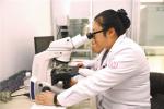 Nov. 22, 2018 -- A doctor is using fluorescence microscopy to observe cell nucleic acid. [China Tibet News/Tenzin Chosphel]
