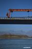 Nov. 27, 2018 -- Workers lay tracks on the Yarlung Zangbo River bridge of the Lhasa-Nyingchi section of the Sichuan-Tibet Railway in Gonggar County of southwest China`s Tibet Autonomous Region, Nov. 26, 2018. The Yarlung Zangbo River bridge, the first cross-river bridge on the Lhasa-Nyingchi section of the Sichuan-Tibet Railway, started its track laying on Monday. (Xinhua/Purbu Zhaxi)