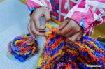 Dec. 3, 2018 -- A girl knits a scarf at a kindergarten in Hangzhou, capital of east China`s Zhejiang Province on Nov. 30, 2018. About 100 colorful scarves, made by the children of an attached kindergarten of Zhejiang University, will be sent to the children in Nagqu City, southwest China`s Tibet Autonomous Region as gifts. (Xinhua/Xu Yu)