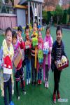 Dec. 3, 2018 -- Children show their self-made scarves to be posted at a kindergarten in Hangzhou, capital of east China`s Zhejiang Province on Nov. 30, 2018. About 100 colorful scarves, made by the children of an attached kindergarten of Zhejiang University, will be sent to the children in Nagqu City, southwest China`s Tibet Autonomous Region as gifts. (Xinhua/Xu Yu)