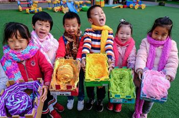 Colorful scarves made by kindergarten children to be sent to Tibet as gifts