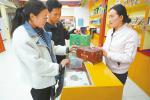 Dec. 12, 2018 -- Photo shows citizens buying local brand yogurt. [China Tibet News/Zhang Bin]