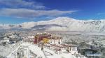 Dec. 21, 2018 -- Aerial photo shows the snow-covered Potala Palace in Lhasa, capital of southwest China`s Tibet Autonomous Region, Dec. 19, 2018. Lhasa witnessed the first snow this winter on Tuesday. (Xinhua/Purbu Zhaxi)