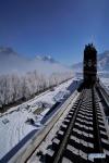 Dec. 24, 2018 -- Photo taken on Dec. 23, 2018 shows a construction site on the Lhasa-Nyingchi section of the Sichuan-Tibet Railway in southwest China`s Tibet Autonomous Region. The Sichuan-Tibet Railway will be the second railway into southwest China`s Tibet Autonomous Region after the Qinghai-Tibet Railway. The line will go through the southeast of the Qinghai-Tibet Plateau, one of the world`s most geologically active areas. (Xinhua/Purbu Zhaxi)