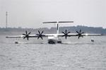 Jan. 1, 2019 -- China`s independently-developed large amphibious aircraft AG600, codenamed Kunlong, slides on the water surface of a reservoir near Zhanghe Airport in Jingmen, central China`s Hubei Province, Oct. 20, 2018. (Xinhua/Cheng Min)