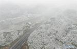Jan. 1, 2019 -- Aerial photo taken on Dec. 30, 2018 shows the snow-covered Tianquan County section of the Ya`an-Kangding expressway in southwest China`s Sichuan Province. An expressway linking Ya`an and Kangding in southwest China`s Sichuan Province went into trial operation Monday morning, marking the total length of expressways in the province at 7,238 km. The construction of the expressway was completed nine months ahead of schedule. It will be the second highway into the Ganzi Tibetan Autonomous Prefecture of Sichuan after the National Highway 318, which leads to Lhasa, capital of Tibet Autonomous Region, said the provincial department of transportation. The newly completed route will enable passengers to travel from Chengdu to Kangding, capital of Ganzi, in only three and a half hours. (Xinhua/Jiang Hongjing)