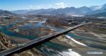 Jan. 7, 2019 -- Aerial photo taken on March 4, 2018 shows a newly-built bridge across the Lhasa River, a tributary of the Yarlung Zangbo River, in southwest China`s Tibet Autonomous Region. Amazing shots of Tibet in 2018 are seen through lenses of Xinhua photographers. (Xinhua/Jigme Dorje)
