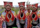 Jan. 11, 2019 -- Photo taken on Aug. 8, 2015 shows folk artists posing for a photo before performing traditional `xuan` dance at Zanda County of Ngari Prefecture, southwest China`s Tibet Autonomous Region. Zanda features the unique landscape of `earth forest` and well-preserved Guge Kingdom site. The ancient Guge Kingdom was founded around the 9th century but disappeared mysteriously during the 17th century. Ngari, at an average altitude of 4,500 meters, is nicknamed the `top of the roof of the world.` It has always been the crown jewel for adventurers and archaeologists, and after them came tourists. (Xinhua/Liu Dongjun) 