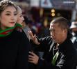 Jan. 28, 2019 -- Tashi adjusts the clothes on models in Lhasa, southwest China`s Tibet Autonomous Region, Jan. 21, 2019. Tashi is a common name around Lhasa`s old town, but on Barkhor Street, Genqoi Tashi, 36, stands out from the crowd with his rattail hanging down his neck. Tashi moved to Lhasa from Ganzi Tibetan Autonomous Prefecture of Sichuan ten years ago. He has had many jobs, from website editor to police officer. He also ran a bar and then a gallery. Now, `Tashi the voguish` is a fashion designer. This winter, he held a show on Barkhor Street as pilgrims and tourists ambled around the Jokhang Temple, marveling at the fusion of fashion and Tibetan tradition. Eight years ago, when a fashion program asked him to recommend a local designer but no one he knew qualified, Tashi found his calling. Creating a modern Tibetan fashion line was nothing but a remote dream, as few people in Tibet followed modern fashion in those days, preferring their traditional gowns. But Tashi persisted, and after six months of preparation, he started up his own fashion brand. His first designs were made of reworked second-hand clothes and sold at friends` shops. His first show was held on a balcony. (Xinhua/Purbu Zhaxi) 