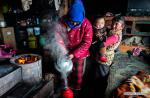 Feb. 1, 2019 -- Herdswoman Qimei and her children are seen at a herdsman resettlement site in Bange County, southwest China`s Tibet Autonomous Region, Jan. 17, 2019. In the past, herdsmen in Tibet endured a ridiculously long, cold winter from October to the end of June, before moving to the summer meadow. They had no fixed residence and migrated when the seasons changed, taking their tents, kitchen utensils and other necessities on horseback. Nowadays, most herdsmen benefit from local resettlement program. They said goodbye to their winter hovels and moved into brick-and-mortar Tibetan-style homes. (Xinhua/Purbu Zhaxi)