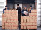 Feb. 11, 2019 -- Workers unload boxes of butter from the 7220190 refrigerator train at the Lhasa West Railway Station in Lhasa, capital of southwest China`s Tibet Autonomous Region, Jan. 27, 2019. (Xinhua/Wu Tao)
