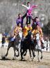 People perform on horses in Lhasa, capital of southwest China`s Tibet Autonomous Region, Feb. 7, 2019. Since 1990, horses have been drifting away from plateau life, as most villages are connected to modern road networks these days. In some places, however, horses have regained their status as a mode of transport. Gyumey Dorje lives at the foot of Mt. Gang Rinpoche, a sacred mountain for Tibetans and a hot tourist attraction. There, villagers offer tourists services such as horseback riding or transferring goods up and down the mountain. `The horse is no common livestock,` said Ngawang Tenzin from the local culture authority. `The changing status of horses reflects the development of Tibet.` (Xinhua/Purbu Zhaxi)