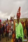 Urgyen stands with his horse in Ngari Prefecture, southwest China`s Tibet Autonomous Region, Aug. 6, 2018. Since 1990, horses have been drifting away from plateau life, as most villages are connected to modern road networks these days. In some places, however, horses have regained their status as a mode of transport. Gyumey Dorje lives at the foot of Mt. Gang Rinpoche, a sacred mountain for Tibetans and a hot tourist attraction. There, villagers offer tourists services such as horseback riding or transferring goods up and down the mountain. `The horse is no common livestock,` said Ngawang Tenzin from the local culture authority. `The changing status of horses reflects the development of Tibet.` (Xinhua/Zhou Jianwei)