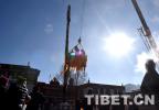 Feb. 13, 2019 -- The workers are changing prayer flags for the five pillars in front of Jokhang Temple in Lhasa, capital of Tibet Autonomous Region.