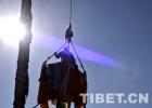 Feb. 13, 2019 -- The workers are changing prayer flags for the five pillars in front of Jokhang Temple in Lhasa, capital of Tibet Autonomous Region.