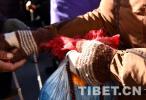 Feb. 13, 2019 -- The workers are changing prayer flags for the five pillars in front of Jokhang Temple in Lhasa, capital of Tibet Autonomous Region.